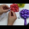 Como elaborar flores con pétalos quemados para tiaras de bebé, video 542